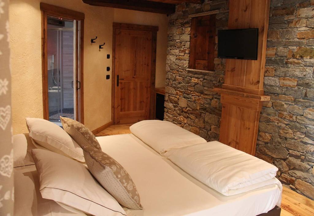 Les Trompeurs Chez Odette Bed & Breakfast Cogne Rom bilde