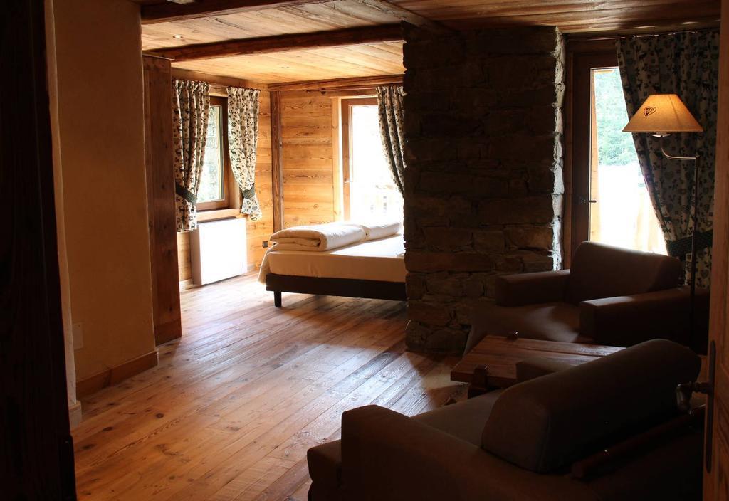 Les Trompeurs Chez Odette Bed & Breakfast Cogne Rom bilde